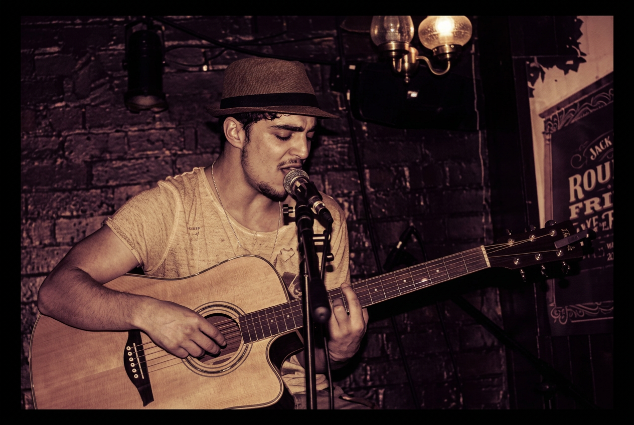 Carl Martin performing live at a pub